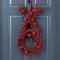 Glitzhome® 24" Red Valentine's XO Shaped Wreath